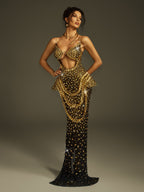 Vestido Maxi Sin Tirantes Arygon en Negro y Dorado con Corte y Detalles de Cristales